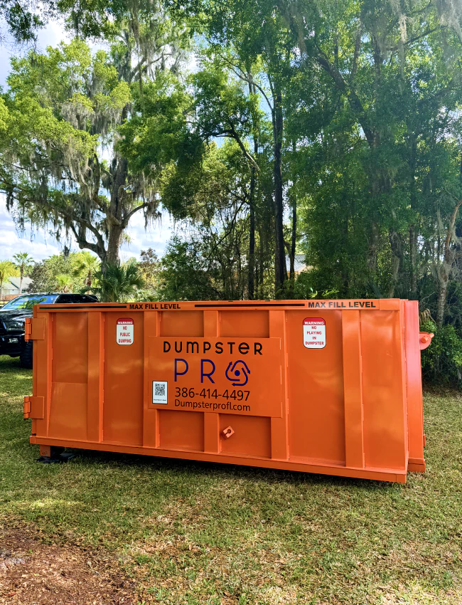 displayed dumpster pro container at the backyard